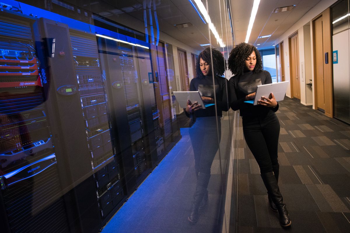 IT professional working near server infrastructure